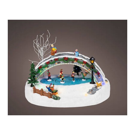VILLAGGIO PISTA GHIACCIO 17,5x28x21cm C/MOVIMENTO