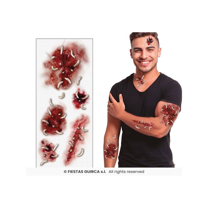 TATAUGGIO FERITA CON VERMI 30x13cm